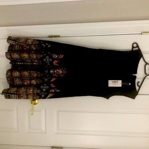 Sleeveless A-line dress, size L, with stained glass motif. Very unique!